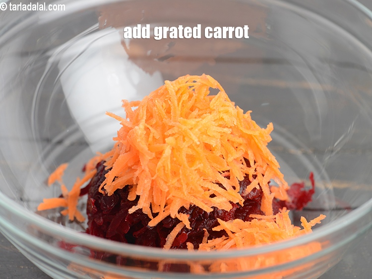 Step 5 – Add 1/4 cup <a href="https://www.tarladalal.com/glossary-grated-carrot-816i">grated carrot</a>.