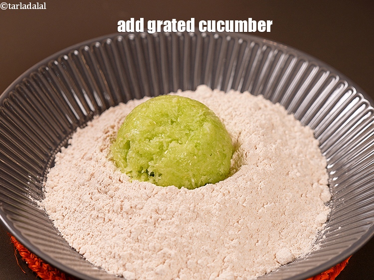 Step 4 – Add 1 1/4 cups&nbsp;<a href="https://www.tarladalal.com/glossary-grated-cucumber-1058i">grated cucumber</a>,&nbsp;peeled and squeezed.