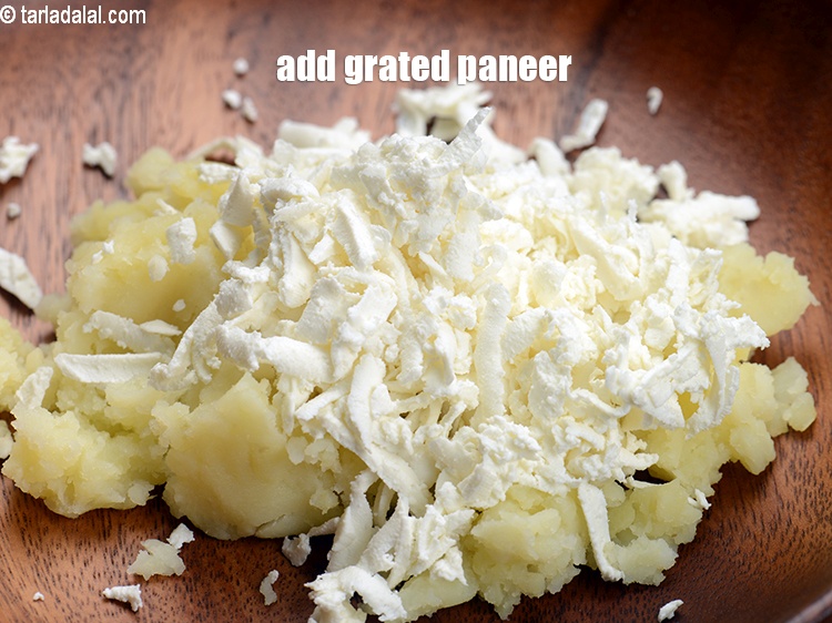 Step 4 – Add &frac12; cup <a href="https://www.tarladalal.com/glossary-grated-panee-1003i">grated paneer (cottage cheese)</a>.&nbsp;