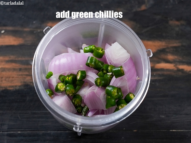 Step 4 – Add 2 tsp roughly&nbsp;<a href="https://www.tarladalal.com/glossary-chopped-green-chilli-820i">chopped green chillies</a>.