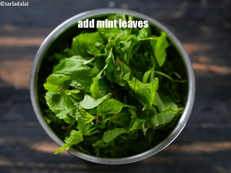 Step 4 – Add 1/2 cup <a href="https://www.tarladalal.com/glossary-mint-leaves-pudina-phudina-521i">mint leaves (pudina)</a>.