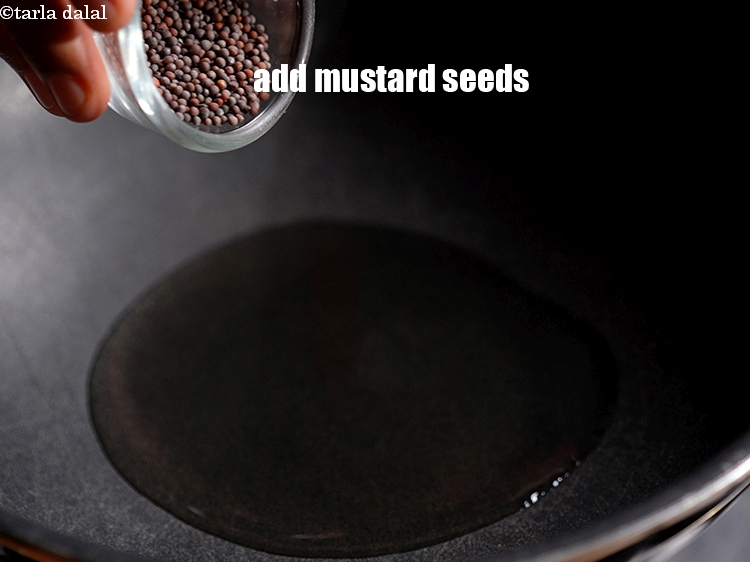 Step 4 – Add 1 tsp&nbsp;<a href="https://www.tarladalal.com/glossary-mustard-seeds-sarson-rai-sarson-ke-beej-525i">mustard seeds ( rai / sarson)</a>.