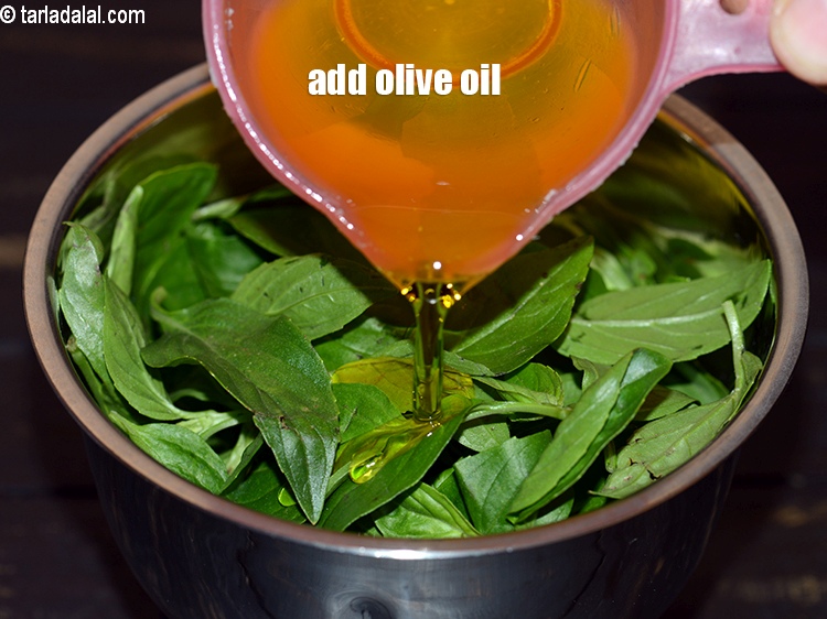 Step 4 – Add 1/4 cup <a href="https://www.tarladalal.com/glossary-olive-oil-451i">olive oil</a>.