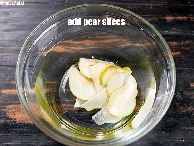 Step 4 – Add 10 <a href="https://www.tarladalal.com/glossary-pear-nashpati-39i">pear</a>&nbsp;slices.