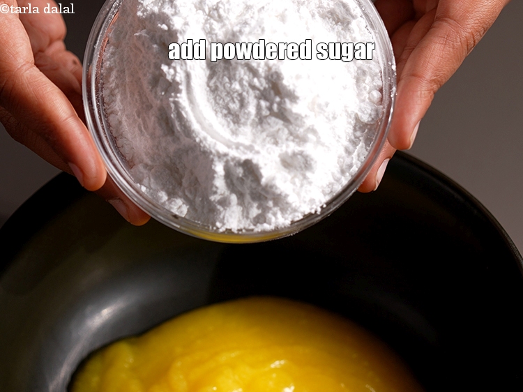Step 4 – Add 1 cup <a href="https://www.tarladalal.com/glossary-powdered-sugar-280i">powdered sugar</a>.