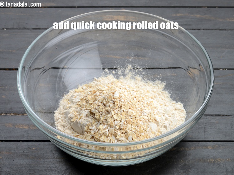 Step 4 – Add &frac14; cup&nbsp;<a href="https://www.tarladalal.com/glossary-quick-cooking-rolled-oats-rolled-oats-547i">quick cooking rolled oats</a>.