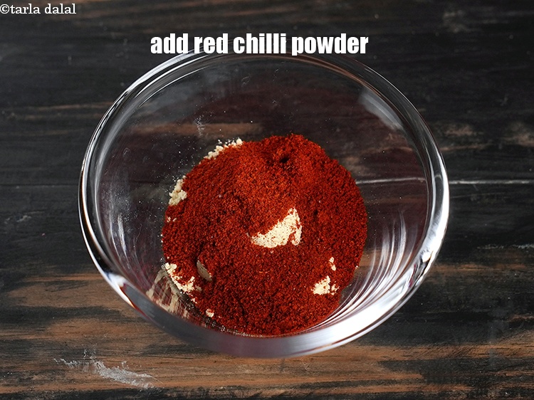 Step 4 – Add &frac34; tbsp red <a href="https://www.tarladalal.com/glossary-chilli-powder-red-chilli-powder-339i">chilli powder</a>.