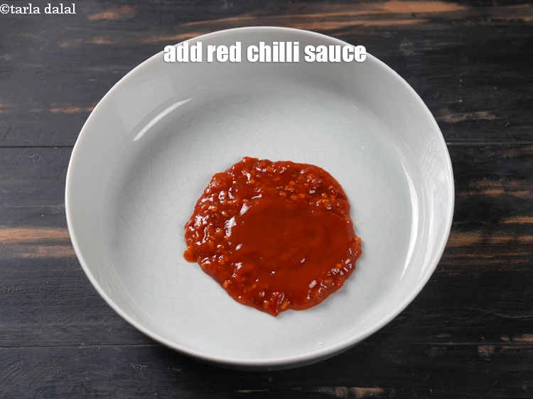 Step 4 – Add&nbsp;2 tbsp&nbsp;<a href="https://www.tarladalal.com/glossary-red-chilli-sauce-lal-chilli-sauce-810i">red chilli sauce</a>.