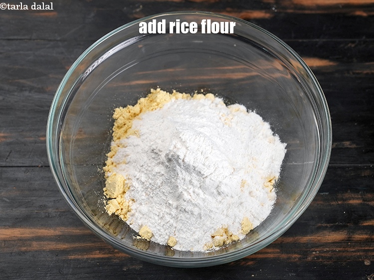 Step 4 – Add 1/4 cup <a href="https://www.tarladalal.com/glossary-rice-flour-chawal-ka-atta-534i">rice flour (chawal ka atta)</a>.
