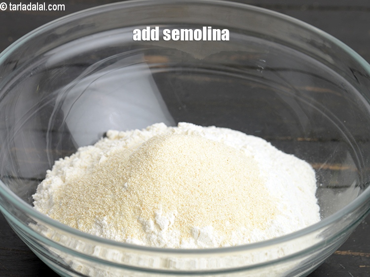 Step 5 – Add 1 tbsp&nbsp;<a href="https://www.tarladalal.com/glossary-semolina-sooji-rava-rawa-603i">semolina (rava / sooji)</a>.