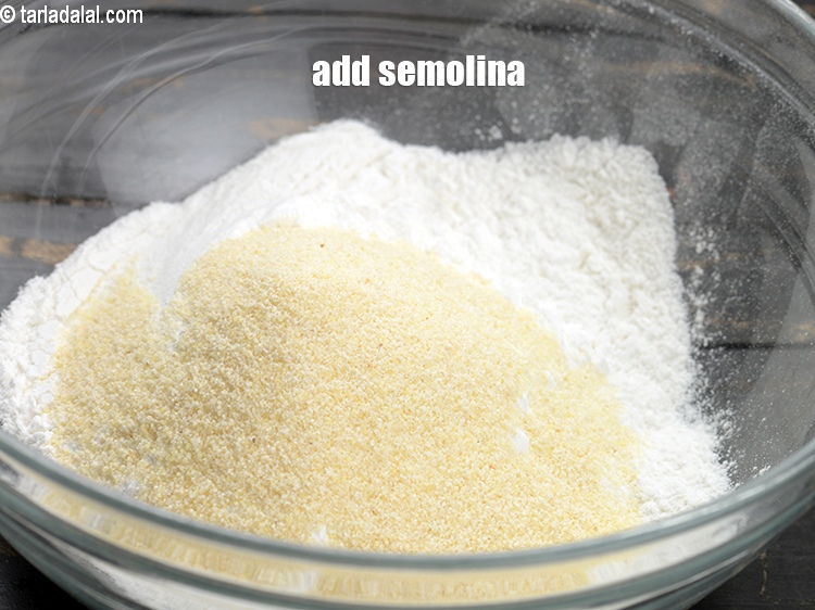 Step 4 – Add 2 tbsp <a href="https://www.tarladalal.com/glossary-semolina-sooji-rava-rawa-603i">semolina (rava / sooji)</a>.