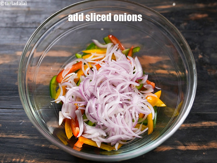 Step 4 – Add 1/2 cup <a href="https://www.tarladalal.com/glossary-sliced-onions-745i">sliced onions</a>.