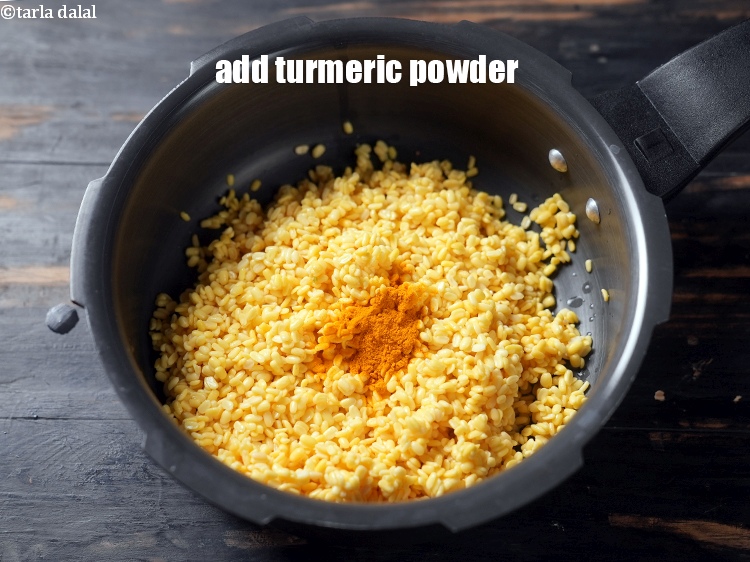 Step 9 – Add &frac12; tsp <a href="https://www.tarladalal.com/glossary-turmeric-powder-haldi-645i">turmeric powder (haldi)</a>.