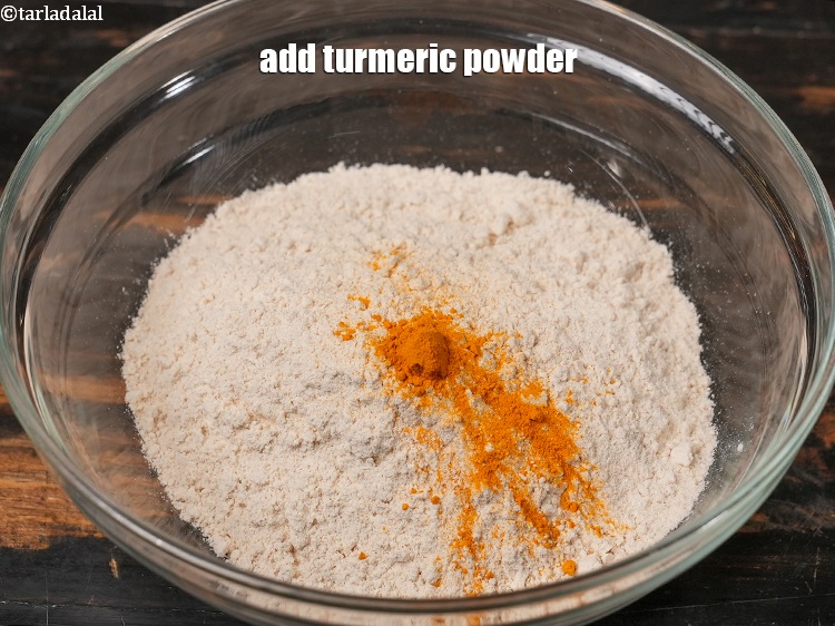 Step 4 – Add &frac14; tsp <a href="https://www.tarladalal.com/glossary-turmeric-powder-haldi-645i">turmeric powder (haldi)</a>.&nbsp;