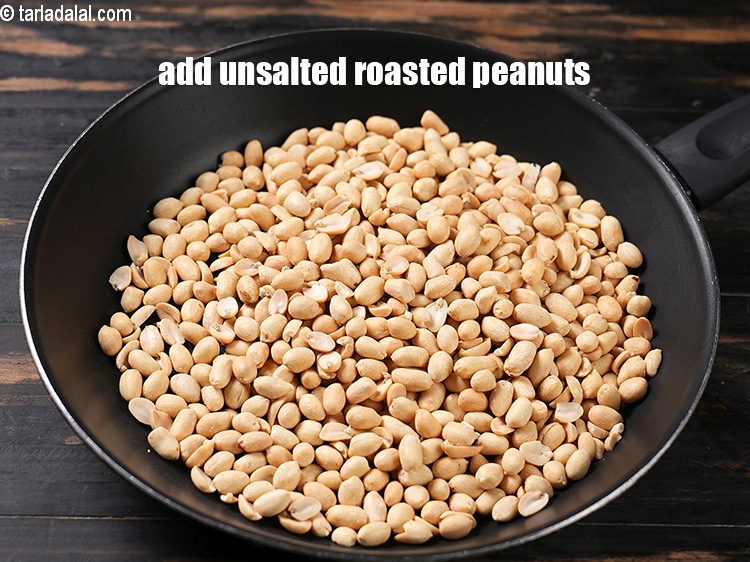 Step 4 – In a broad non-stick pan, add 2 1/4 cups of&nbsp;unsalted&nbsp;<a href="https://www.tarladalal.com/glossary-roasted-peanuts-871i">roasted peanuts</a>&nbsp;, peeled.