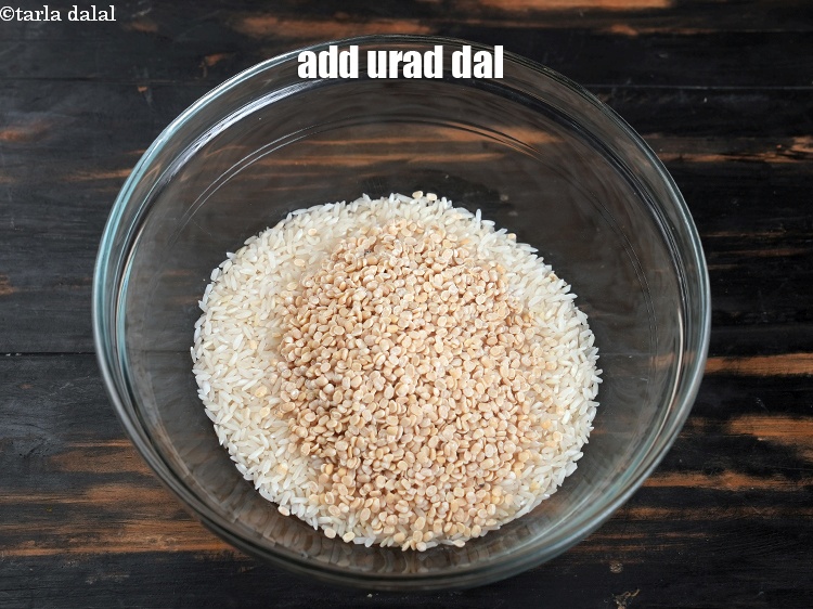 Step 4 – Add &frac14; cup <a href="https://www.tarladalal.com/glossary-urad-dal-split-black-lentil-941i">urad dal (split black lentils)</a>&nbsp;.