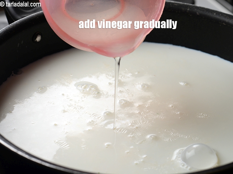 Step 4 – Once boiled, add the vinegar gradually. Keep stirring it gently.