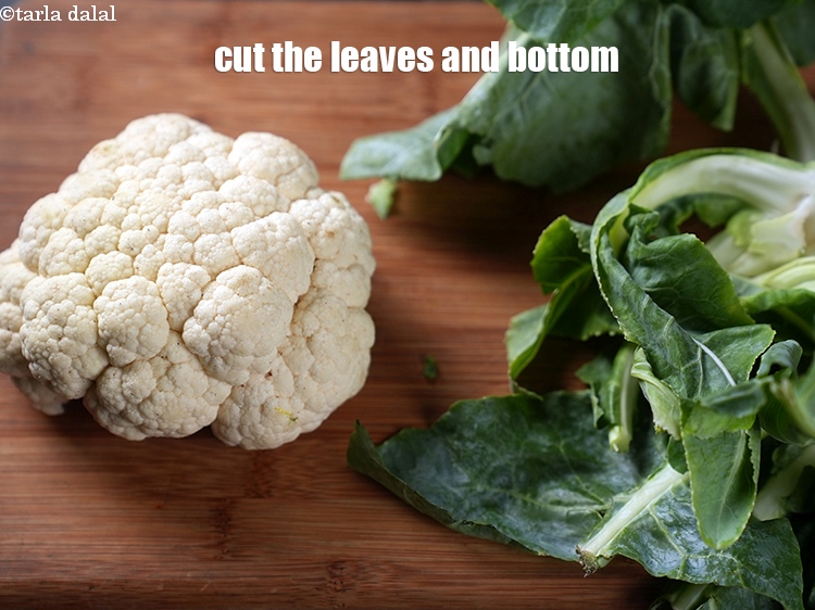 Step 3 – Cut the leaves and the bottom part of the cauliflower.