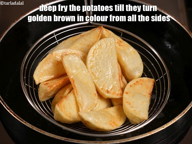 Step 4 – Deep fry the potatoes till they turn golden brown in colour from all the sides.