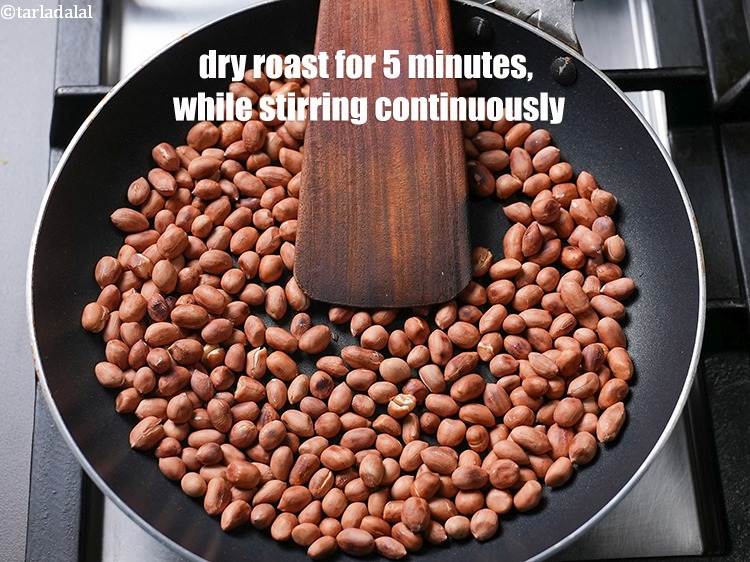 Step 4 – Dry roast the peanuts on medium flame for 5 minutes, while stirring continuously.
