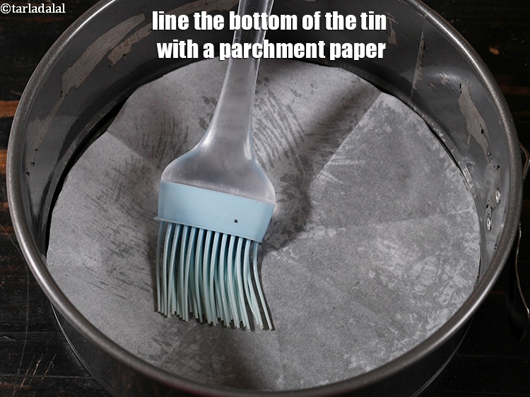Step 4 – Line the bottom of the tin with a parchment paper. Keep aside.