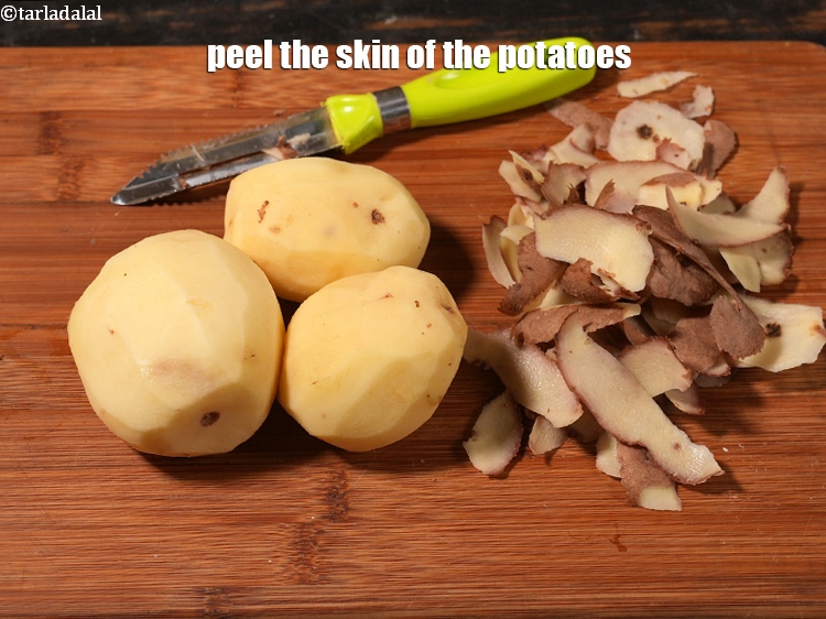 Step 5 – Peel the skin of the potatoes.