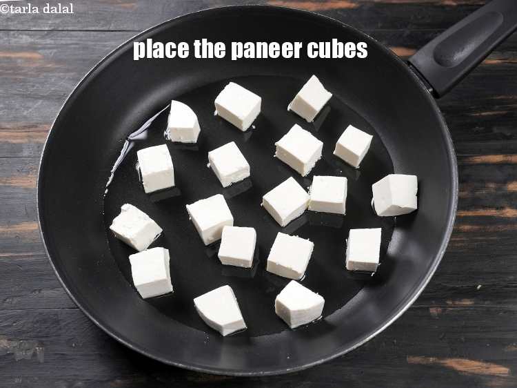 Step 8 – Place 1&frac12; cups of <a href="https://www.tarladalal.com/glossary-paneer-cubes-cottage-cheese-cubes-1002i">paneer (cottage cheese) cubes</a>.