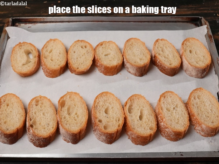 Step 4 – Place the slices on a baking tray.