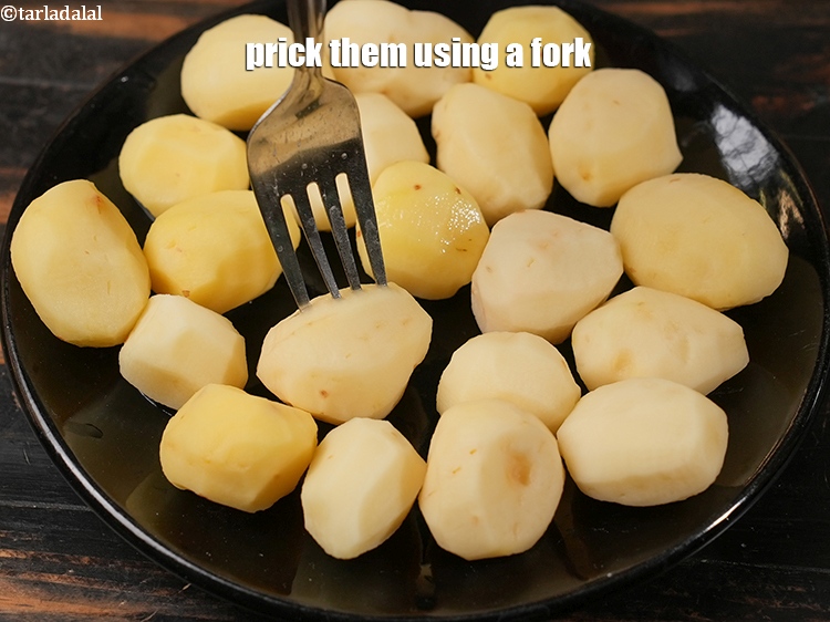 Step 4 – Prick them using a fork and keep aside.