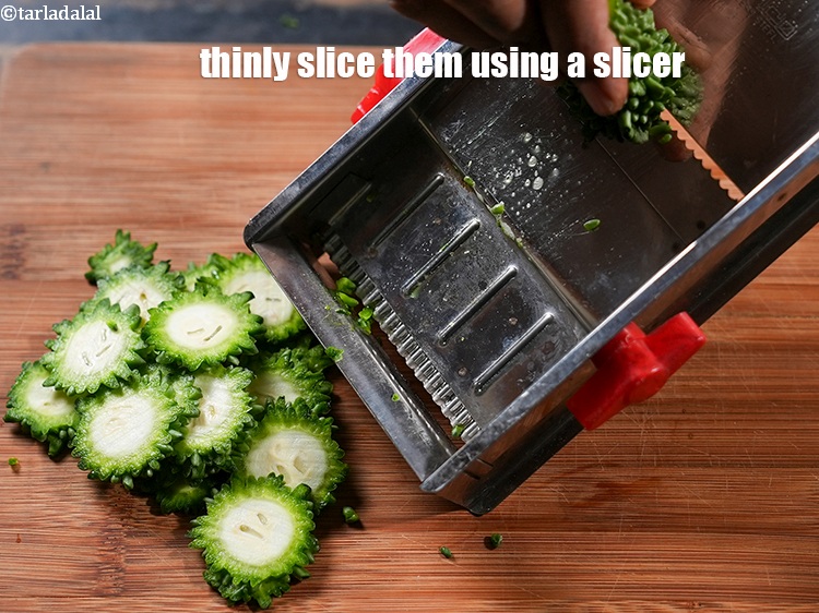 Step 4 – Thinly slice them using a slicer.