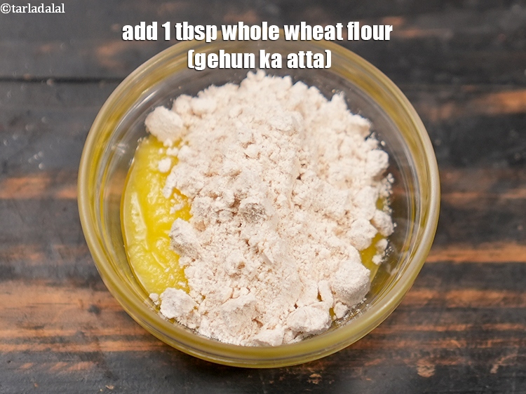 Step 22 – Add 1 tbsp&nbsp;<a href="https://www.tarladalal.com/glossary-whole-wheat-flour-gehun-ka-atta-gehun-ka-aata-429i">whole wheat flour (gehun ka atta)</a>.