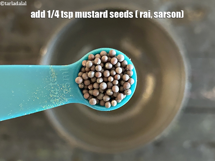 Step 24 – Add&nbsp;<meta charset="UTF-8" />1/4 tsp&nbsp;<a href="glossary-mustard-seeds-sarson-rai-sarson-ke-beej-525i">mustard seeds ( rai / sarson)</a>.