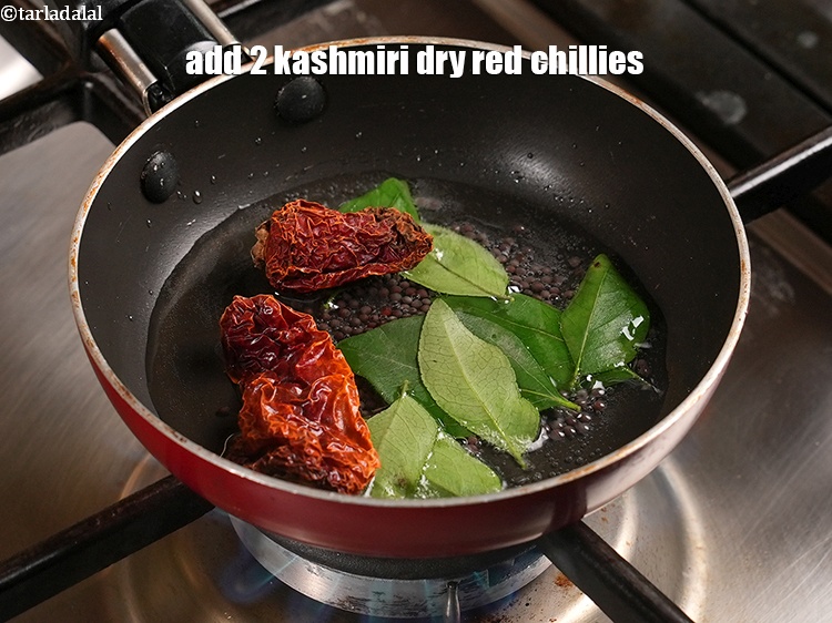 Step 24 – Add 2 kashmiri dry red chillies.
