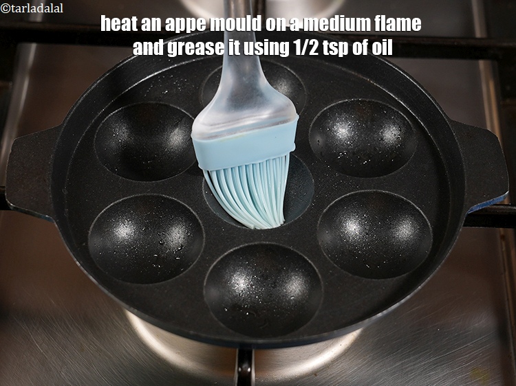 Step 24 – Heat an appe mould on a medium flame and grease it using 1/2 tsp of …