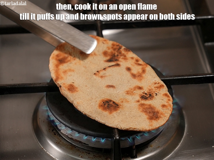 Step 22 – Then, cook it on an open flame till it puffs up and brown spots appear …