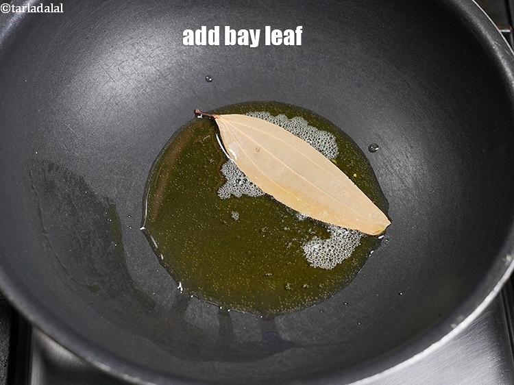 Step 22 – Add 1 <a href="https://www.tarladalal.com/glossary-bay-leaf-tejpatta-bay-leaves-189i">bay leaf (tejpatta)</a>.&nbsp;