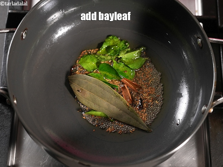 Step 22 – Add 1 <a href="https://www.tarladalal.com/glossary-bay-leaf-tejpatta-bay-leaves-189i">bayleaf (tejpatta)</a>.&nbsp;