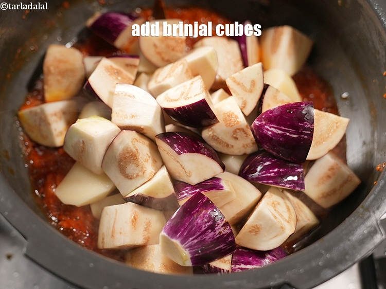 Step 22 – Add 2 cups&nbsp;<a href="https://www.tarladalal.com/glossary-brinjal-cubes-132i">brinjal (baingan / eggplant) cubes</a>.