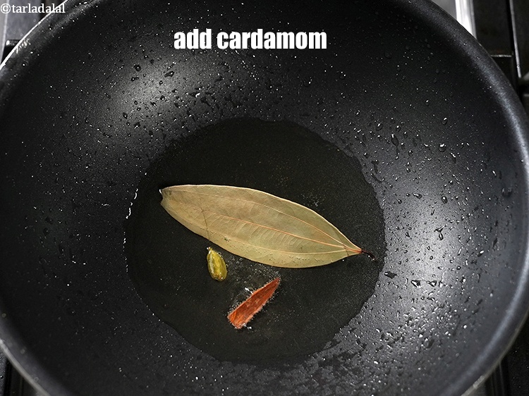 Step 22 – Add 1&nbsp;<a href="https://www.tarladalal.com/glossary-cardamom-elaichi-262i">cardamom (elaichi)</a>.