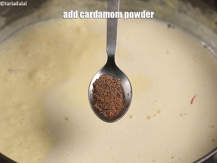 Step 22 – Add &frac12; tsp <a href="https://www.tarladalal.com/glossary-cardamom-powder-elaichi-powder-265i">cardamom (elaichi) powder</a>.