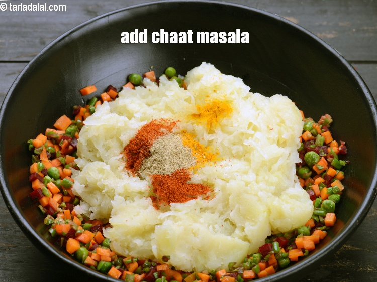 Step 23 – Add 1 tsp <a href="https://www.tarladalal.com/glossary-chaat-masala-300i">chaat masala</a>.