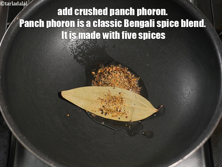 Step 23 – Add 1 tsp <a href="https://www.tarladalal.com/glossary-crushed-panch-phoron-2634i">crushed panch phoron</a>. Panch phoron is a classic Bengali spice blend. …