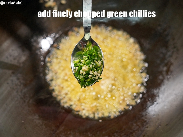 Step 23 – <p>Add 1 tsp finely&nbsp;<a href="https://www.tarladalal.com/glossary-chopped-green-chilli-820i">chopped green chillies</a>.</p>