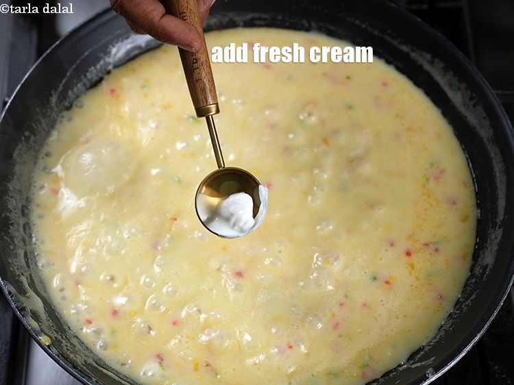 Step 22 – Add 1 tsp fresh cream.