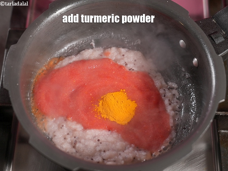 Step 22 – Add &frac12; tsp <a href="https://www.tarladalal.com/glossary-turmeric-powder-haldi-645i">turmeric powder (haldi)</a>.&nbsp;