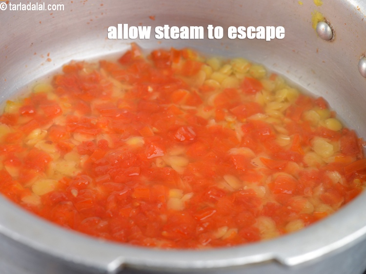Step 23 – Allow the steam to escape before opening the lid.