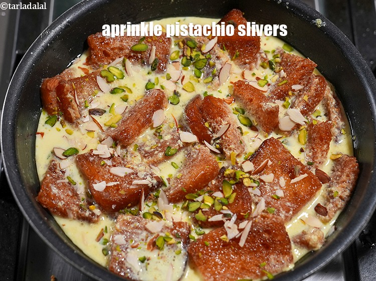 Step 22 – Sprinkle some&nbsp;<a href="https://www.tarladalal.com/glossary-pistachio-slivers-894i">pistachio slivers</a>.
