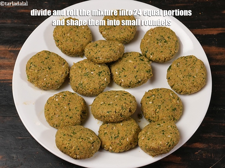 Step 22 – Divide and roll the mixture into 24 equal portions and shape them into small roundels.