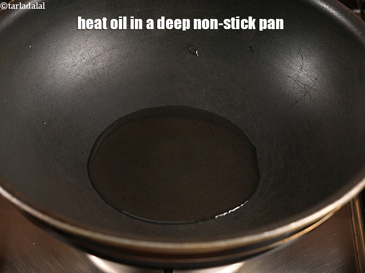 Step 22 – Heat 2 tbsp oil in a deep non-stick pan.
