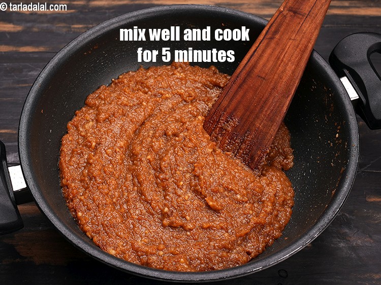 Step 27 – Mix well and cook on a medium flame for 5 minutes, while stirring continuously.